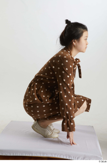 Aera  1 brown dots dress casual dressed kneeling white…